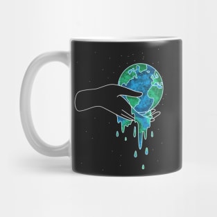 Hand holding melting earth Mug